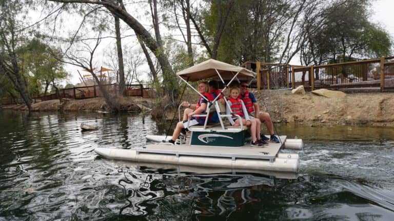 Family on a paddle boat on Quinn Quarry Lake