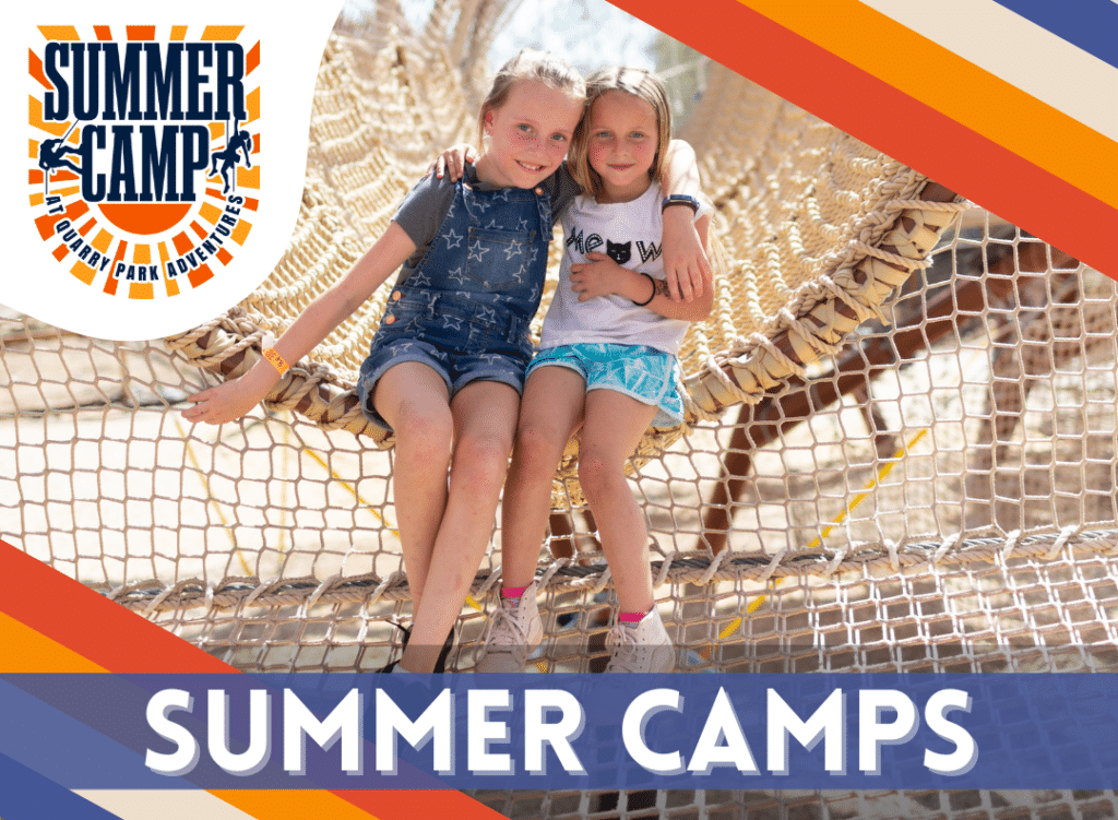 Two children sitting on a rope bridge at a summer camp playground. The summer camp logo is visible in the corner. Text reads "Summer Camps" at the bottom.